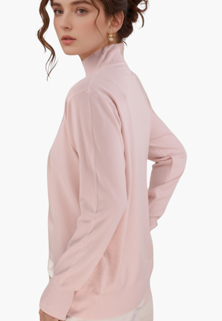 Front view of a pink turtleneck sweater showcasing long sleeves.