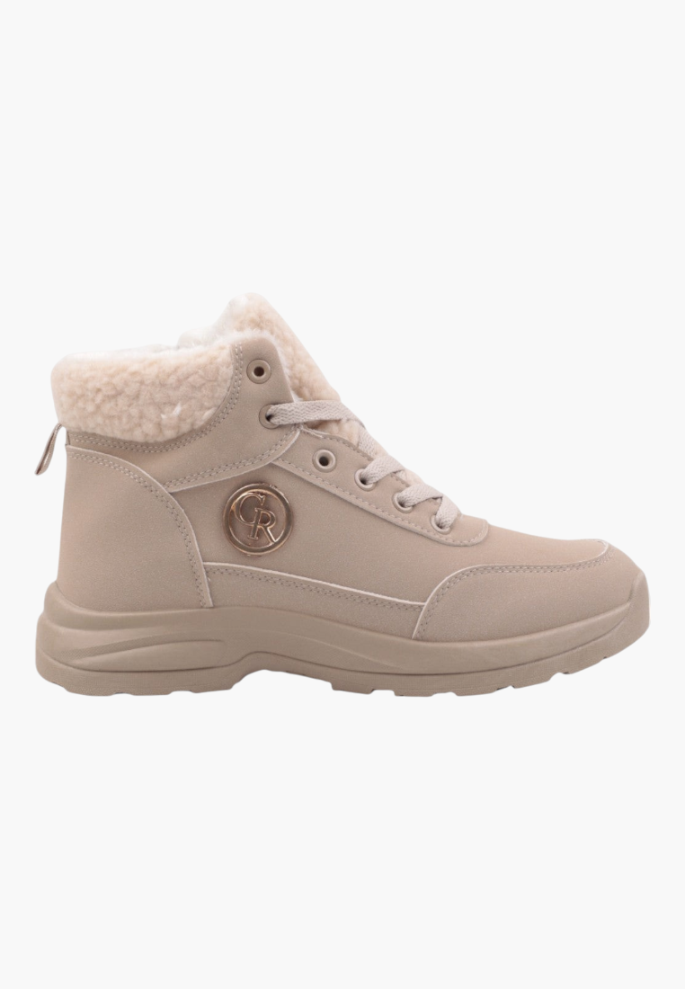 Side view of beige winter boot featuring a fur collar and logo detail.