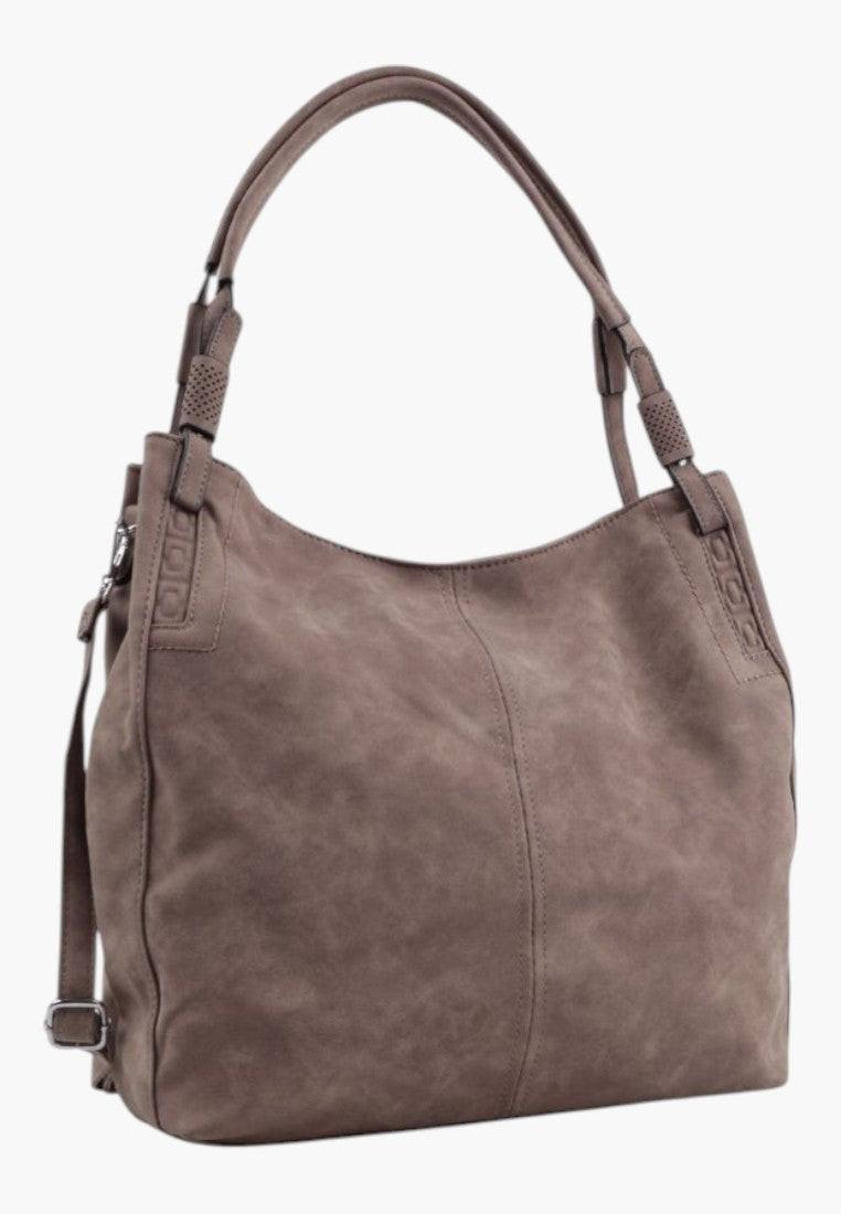 Boczny widok wielokolorowej torebki damskiej shopper na ramię z miękkiego materiału.