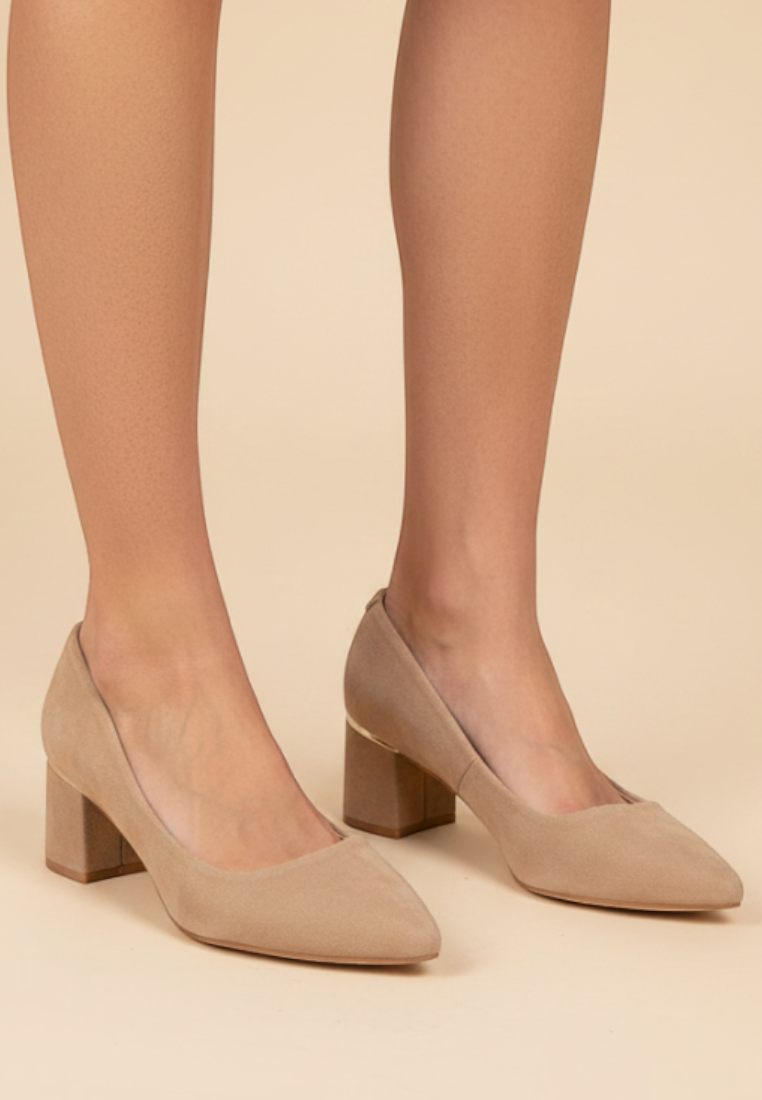 Falio beige faux suede block heel pumps with a pointed toe and metallic detail on a neutral studio background