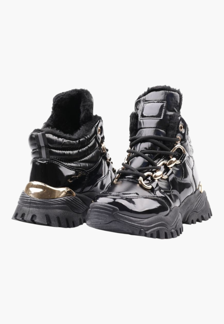 Falio black patent faux leather high-top sneakers with a decorative gold chain, fur lining, and chunky flat sole.