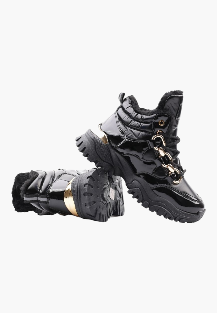Falio black patent leather ankle sneakers with fur lining, gold chain detail, and thick flat sole.