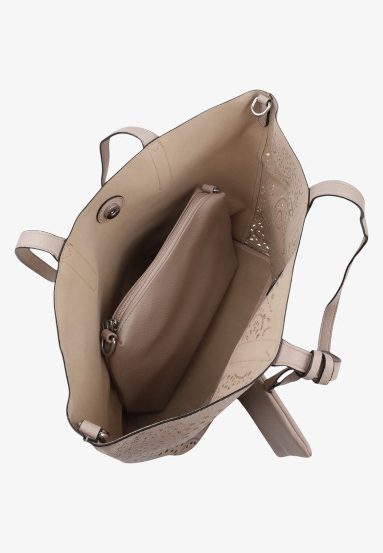 Detail shot of the beige handbag interior showing two compartments and a snap closure.