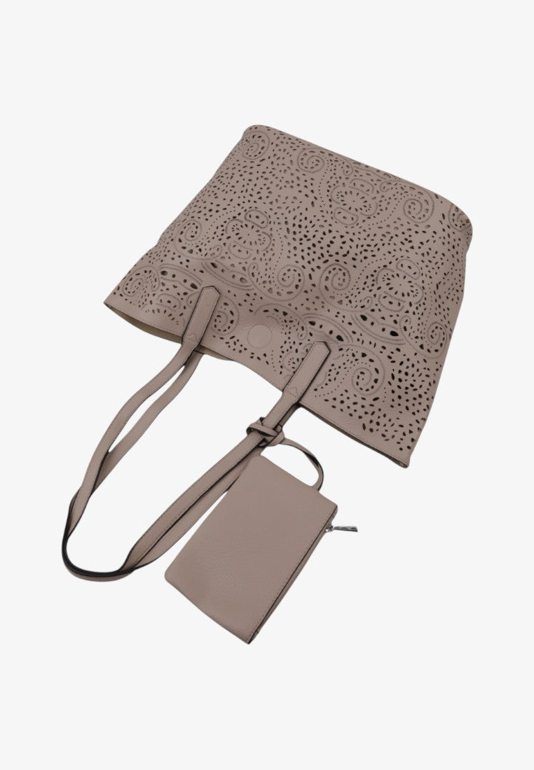 Top view detail of a beige tote bag showcasing its patterned design on a white background.