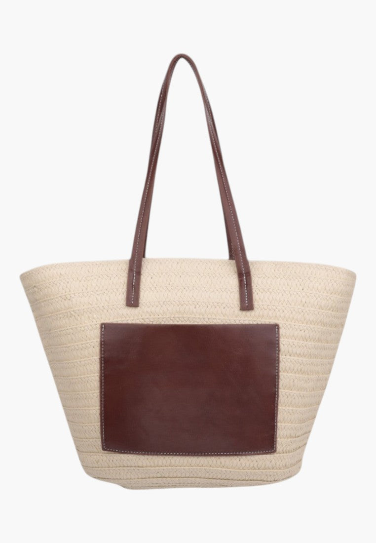 Front view of the beżowa torebka shopper z długimi paskami i kieszonką.