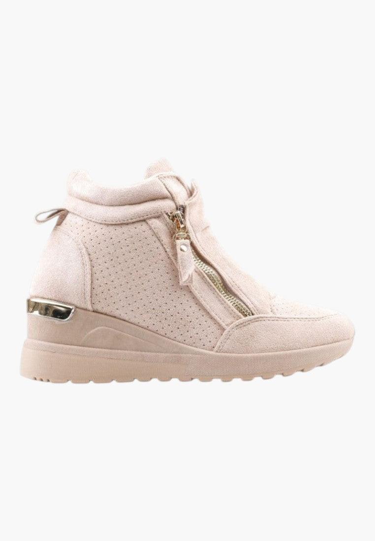 Side view of beige wedge sneakers featuring a wedge heel on a white background