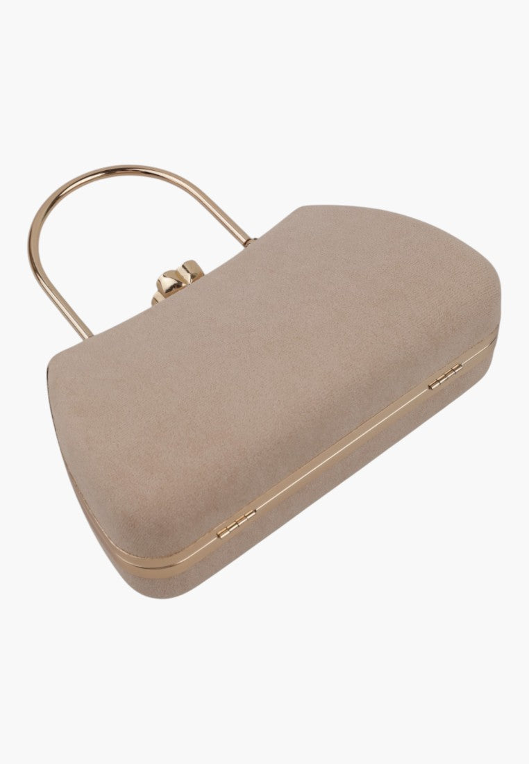 Detail shot of a beige handbag highlighting the gold clasp and structured design.