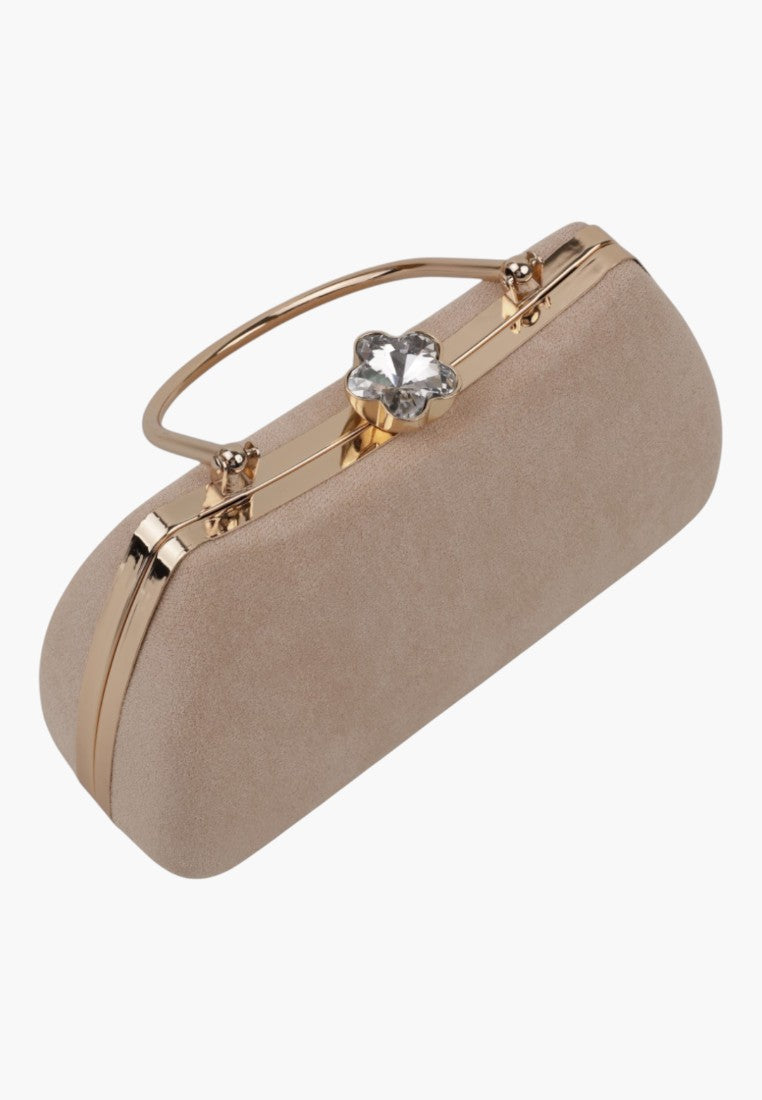 Side view of a beige handbag featuring a smooth texture and top handle.