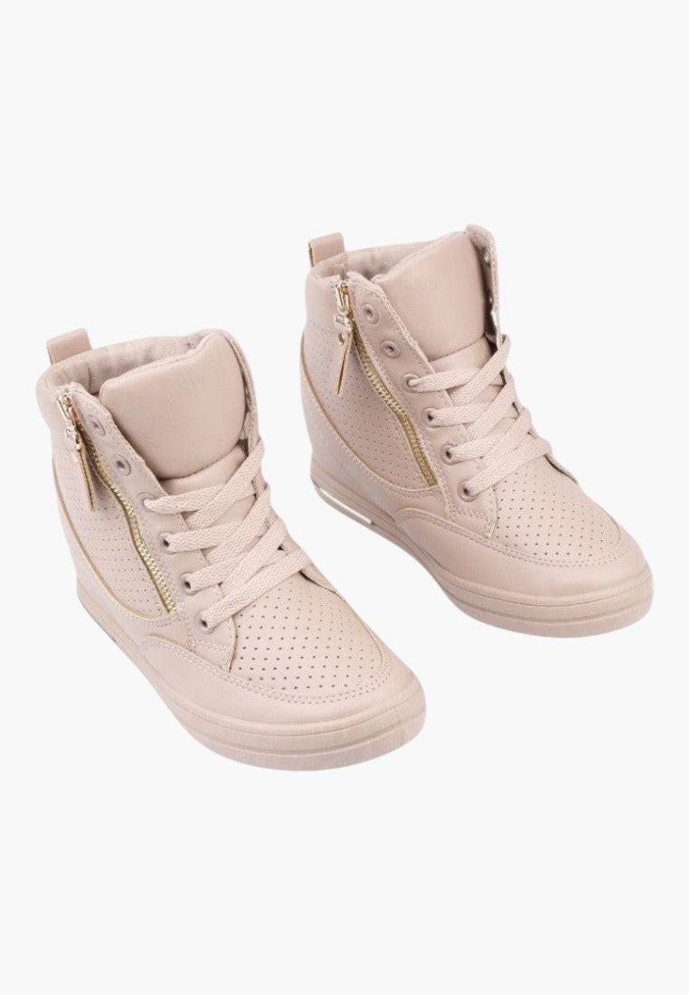 Front view of beige wedge sneakers with lace-up design on a white background