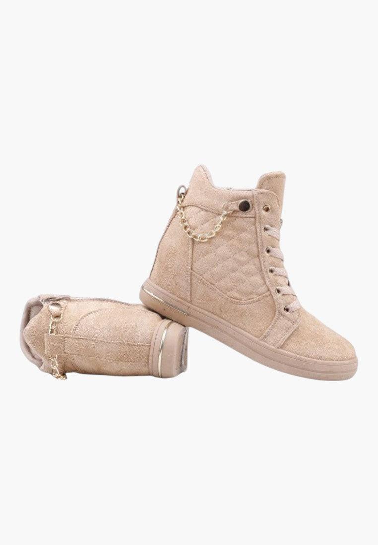 Side view of beige wedge sneakers highlighting lace-up design on a white background