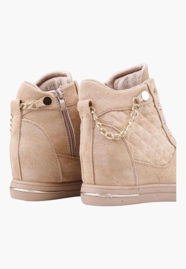 Back view of beige high-top sneakers with zipper detail on a white background