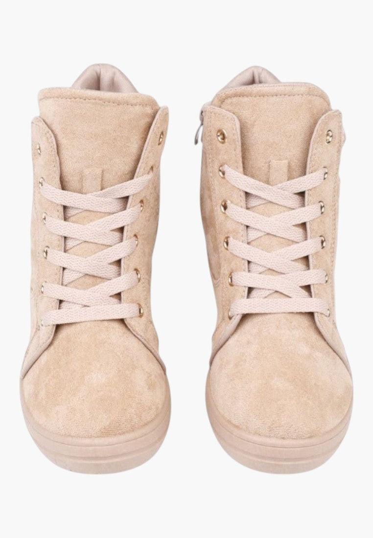 Front view of beige high-top sneakers with zipper detail on a white background
