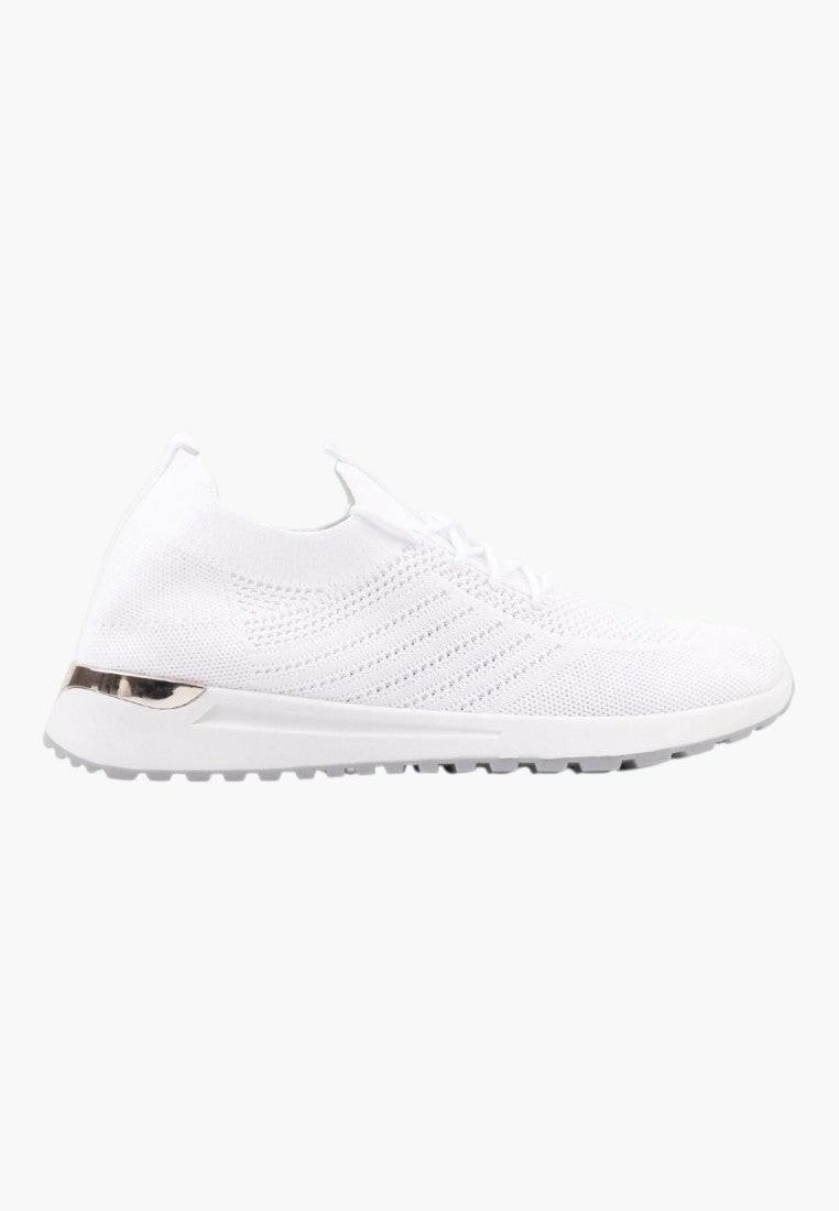 Białe buty sportowe z minimalistycznym designem, widok z boku.