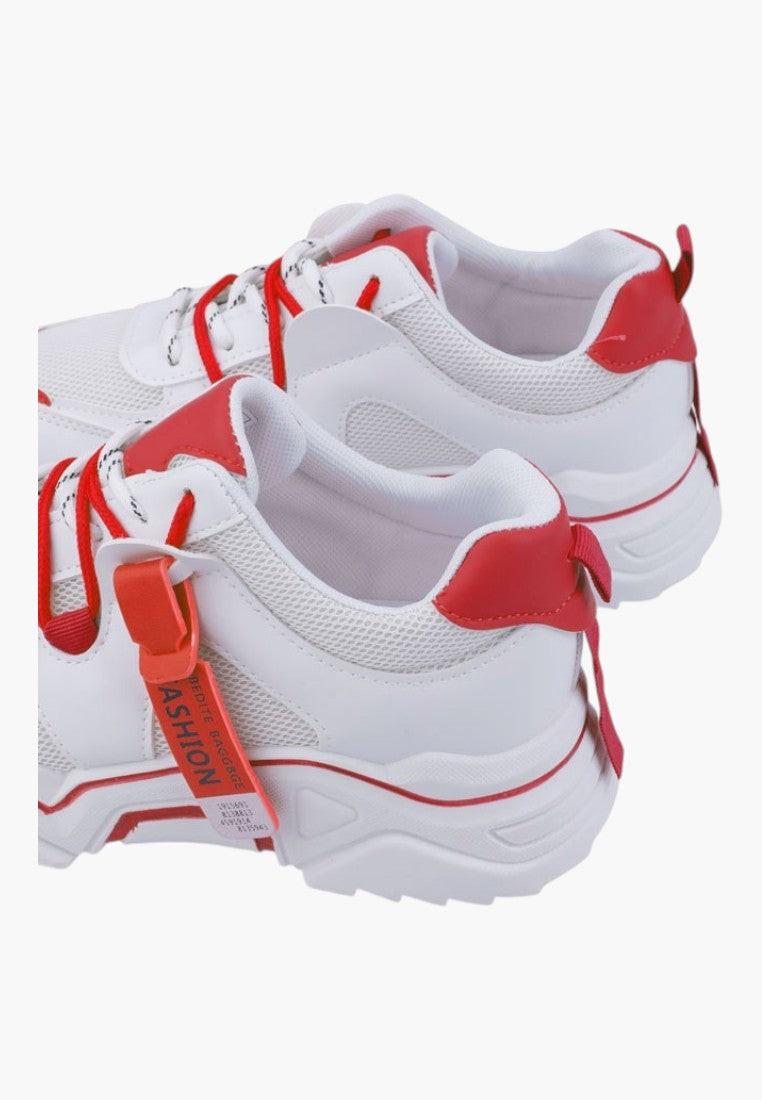 Białe i czerwone sneakersy bez sznurowadeł, widok z boku