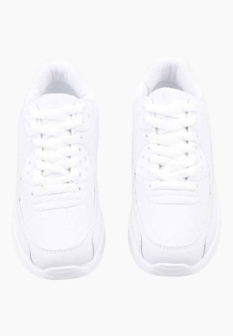 Białe sneakersy z ekoskóry, widok z przodu, poduszka pod piętą