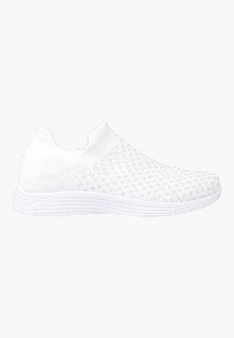 Białe sneakersy minimalistyczne, widok z boku.