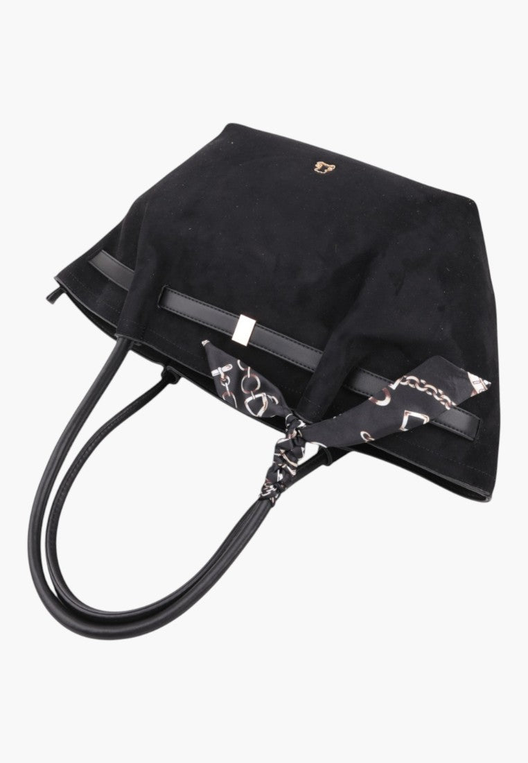 Detail view of the black faux leather shopper bag with decorative scarf tie.