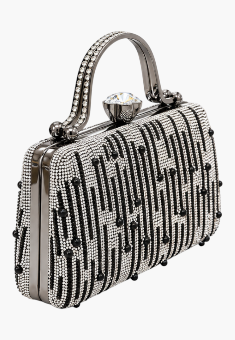 Side view of the wielokolorowa kopertówka wizytowa in silver and black featuring a zipper closure and textured design.
