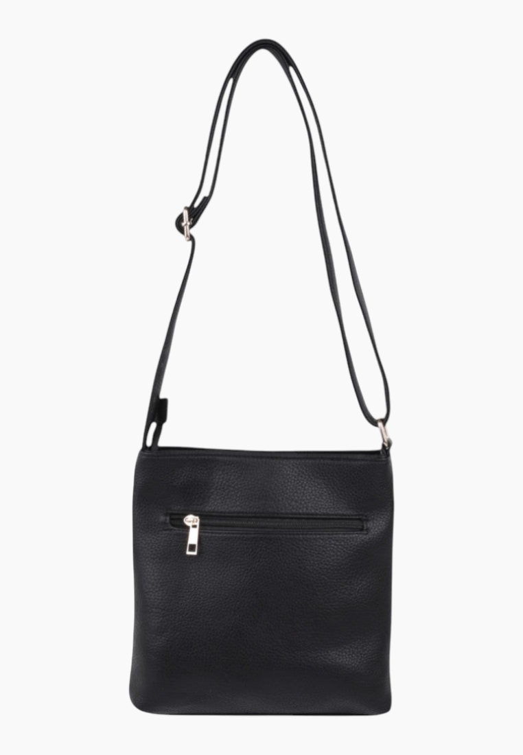 Back view of the black handbag featuring a simple design and adjustable strap.