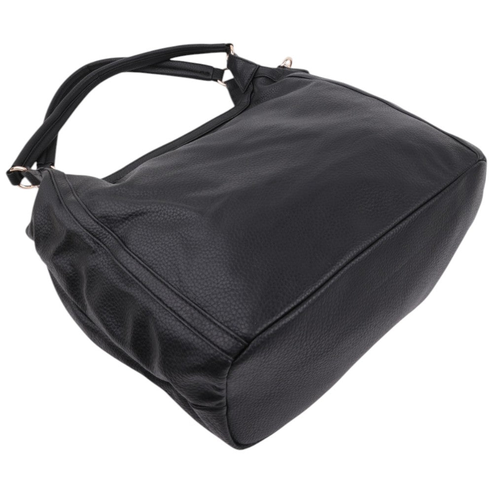 Side view of the black handbag with a single handle on a different background