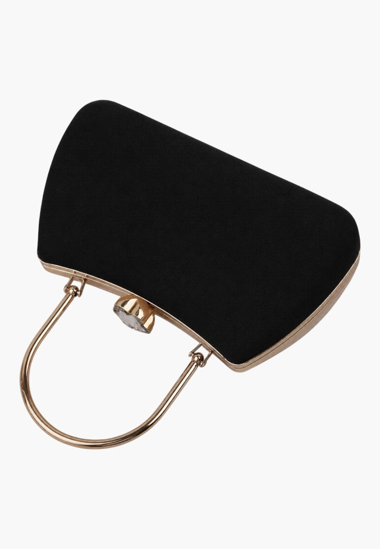 Back view of a black handbag with a smooth texture and gold handle on a white background