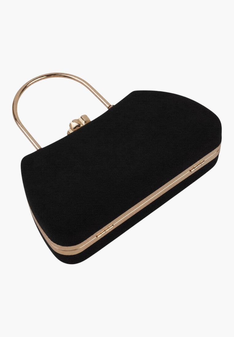 Close-up detail of a black handbag showcasing gold hardware and top closure on a white background