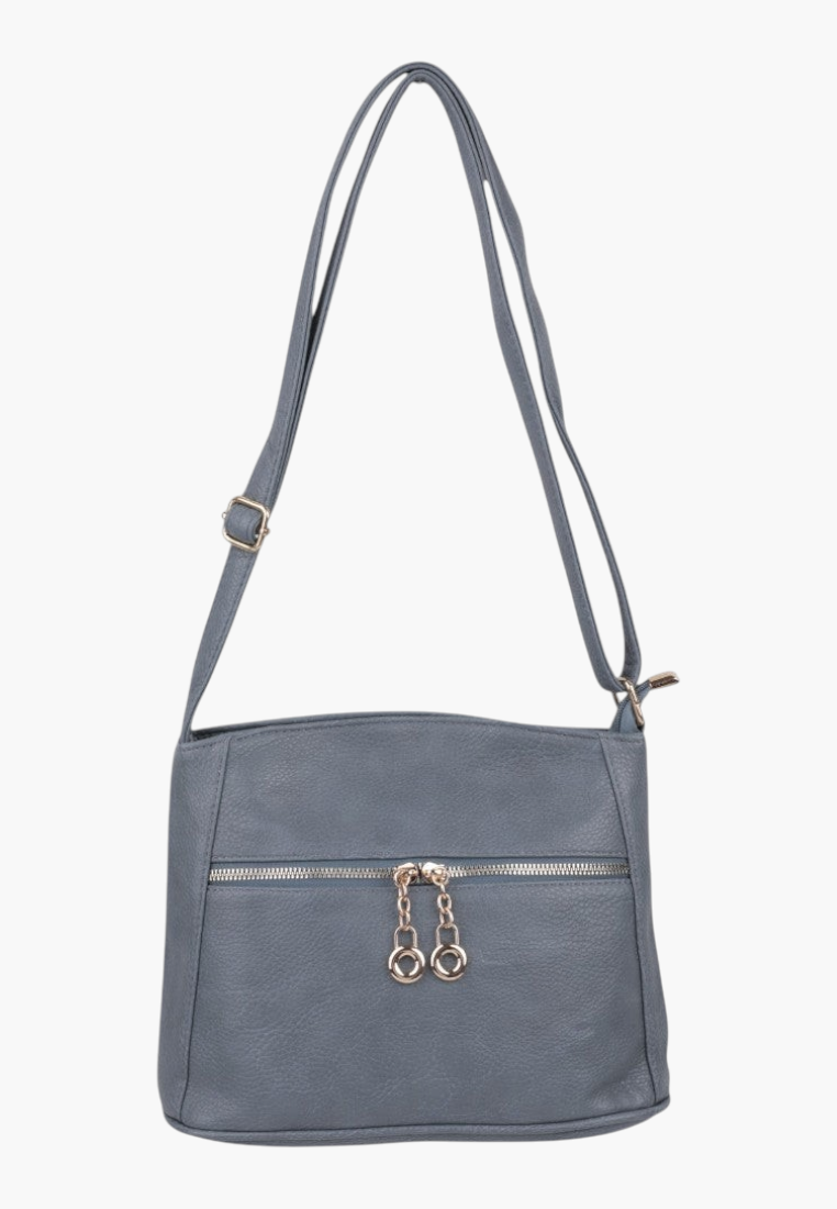 Side view of a blue handbag featuring a zipper closure and gold hardware against a white backdrop.