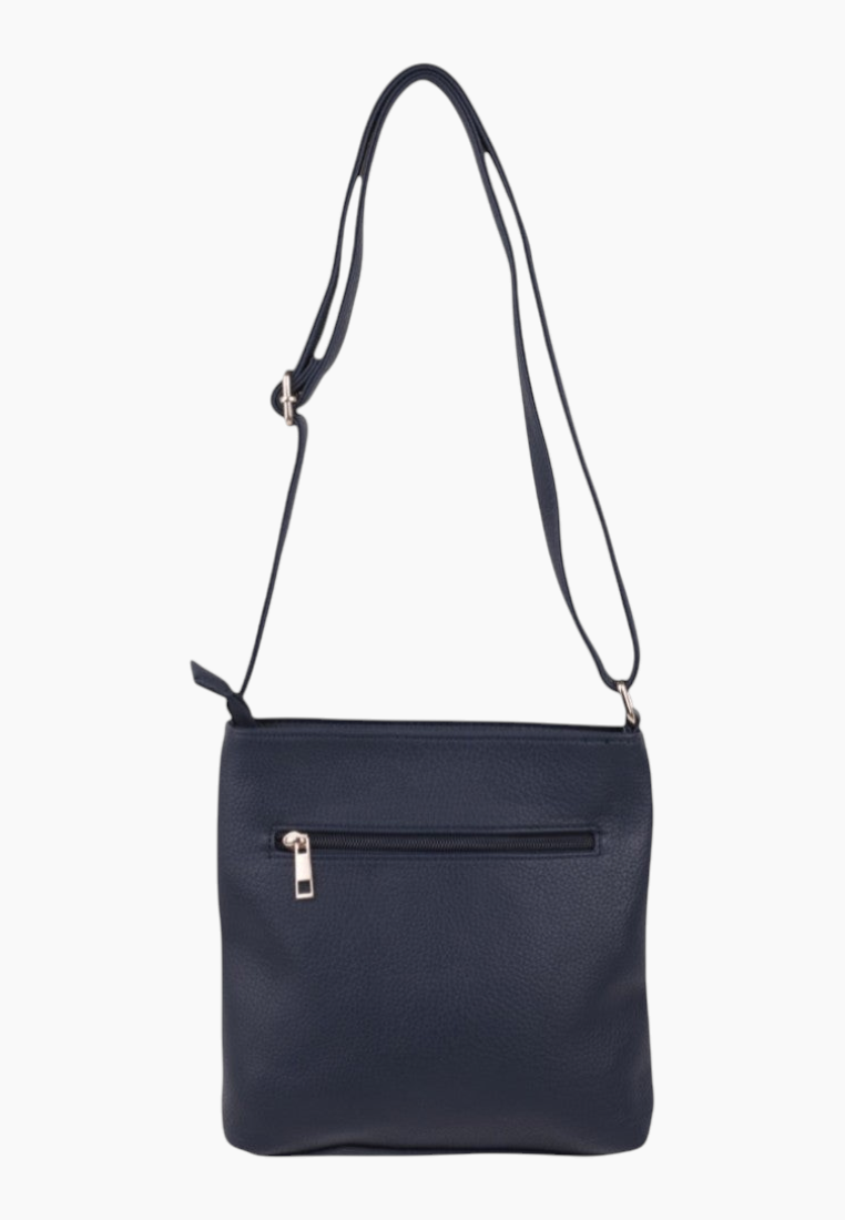 Side view of the navy handbag featuring a single strap and zipper closure.