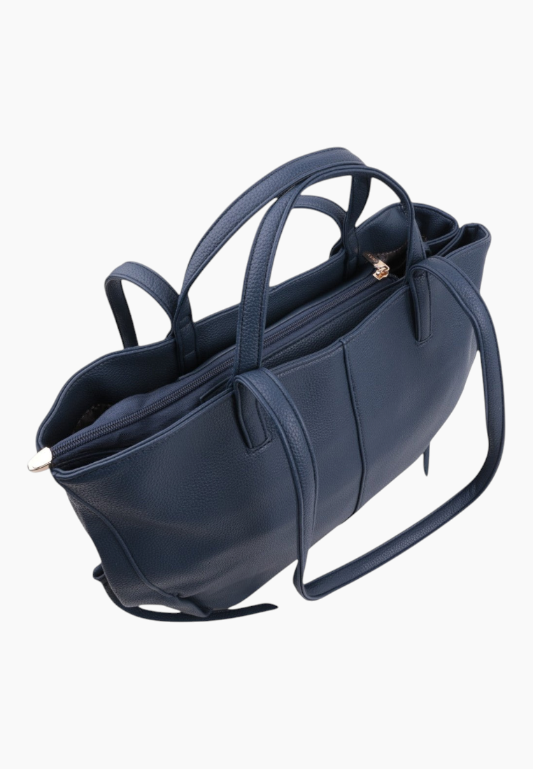 Side view of a navy handbag featuring multiple handles and a zipper closure.