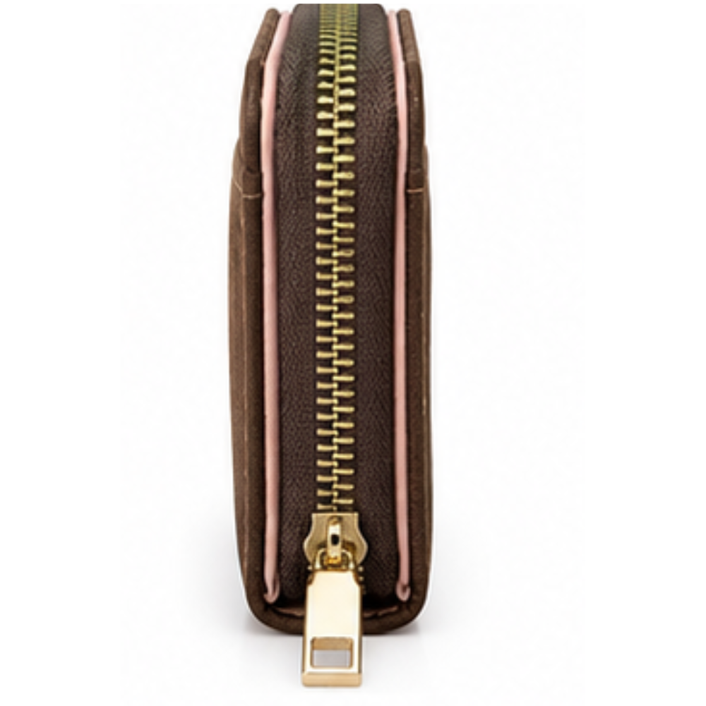 Side view of the brown wallet featuring zipper and gold hardware.