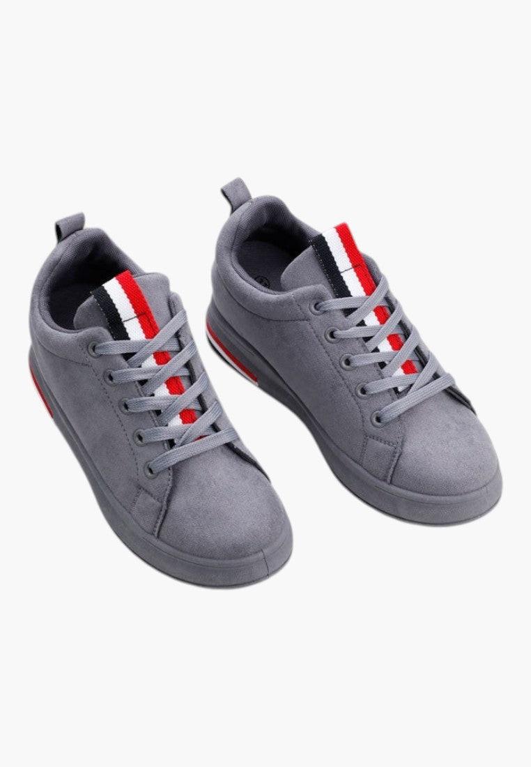 Widok z przodu ciemno szarych sneakersów damskich z ekozamszu