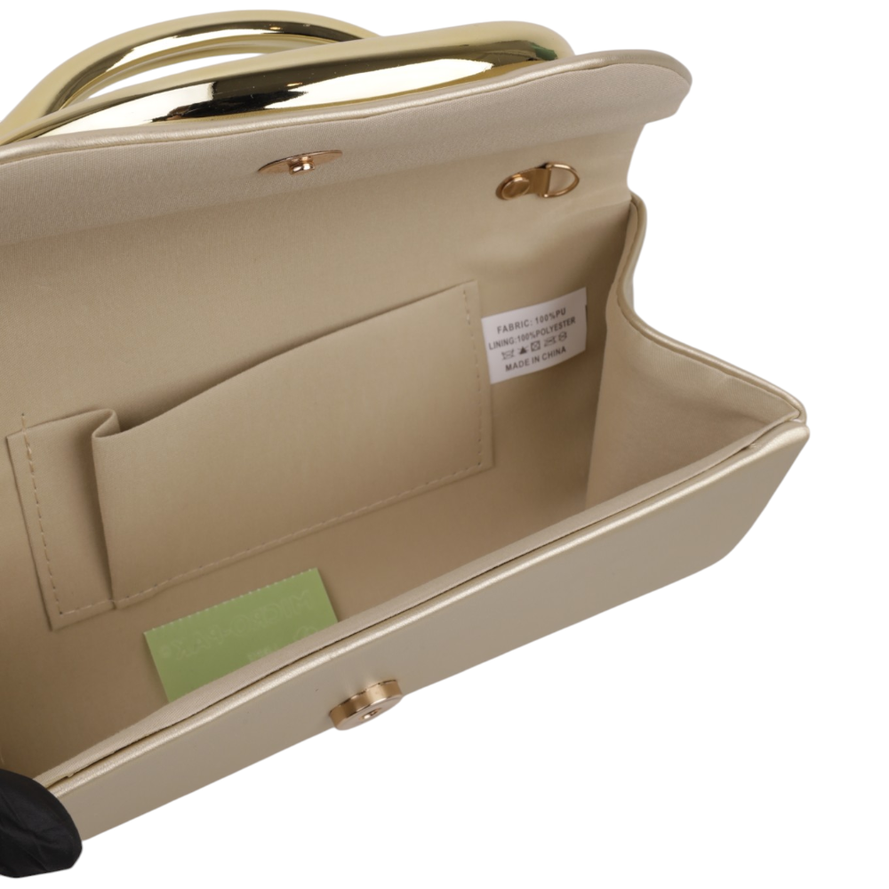 Detail of the interior of the clutch bag featuring an inner pocket and gold hardware.