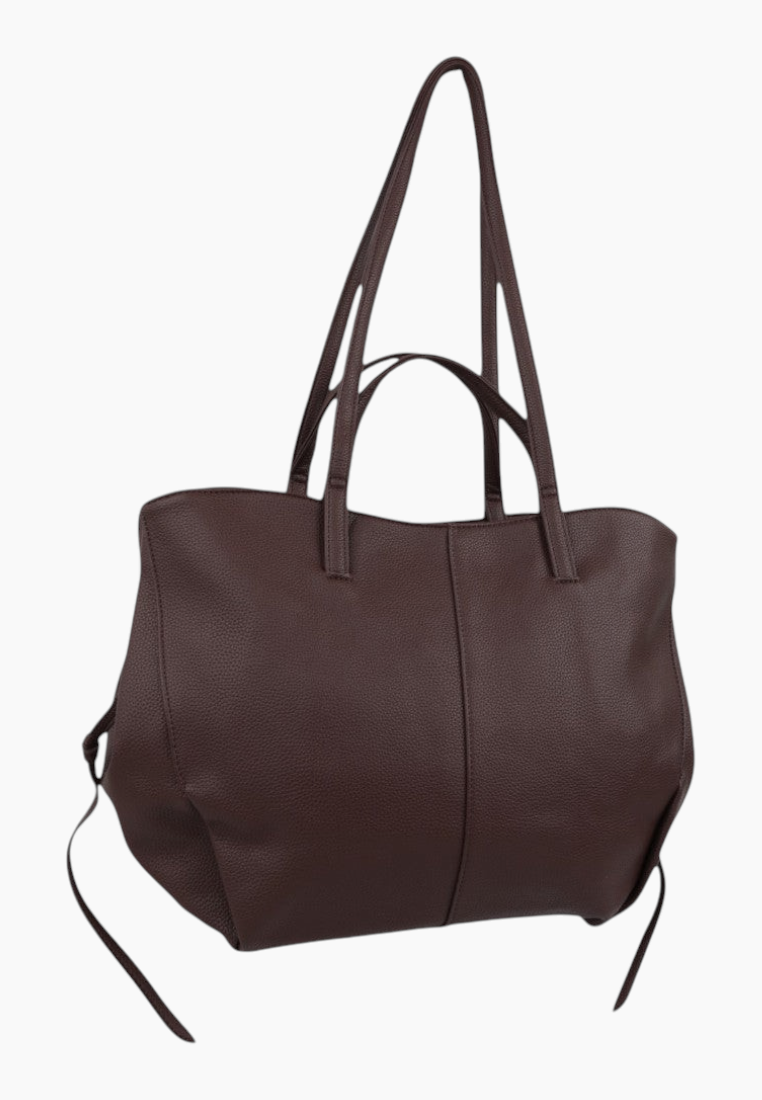 Front view of a brown tote bag with two handles on a white background.
