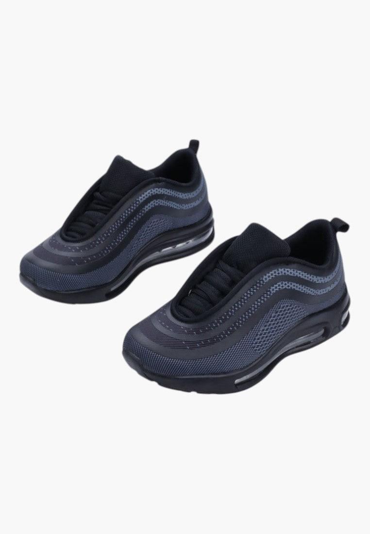 Czarne buty damskie sportowe, widok z boku, zaokrąglona podeszwa