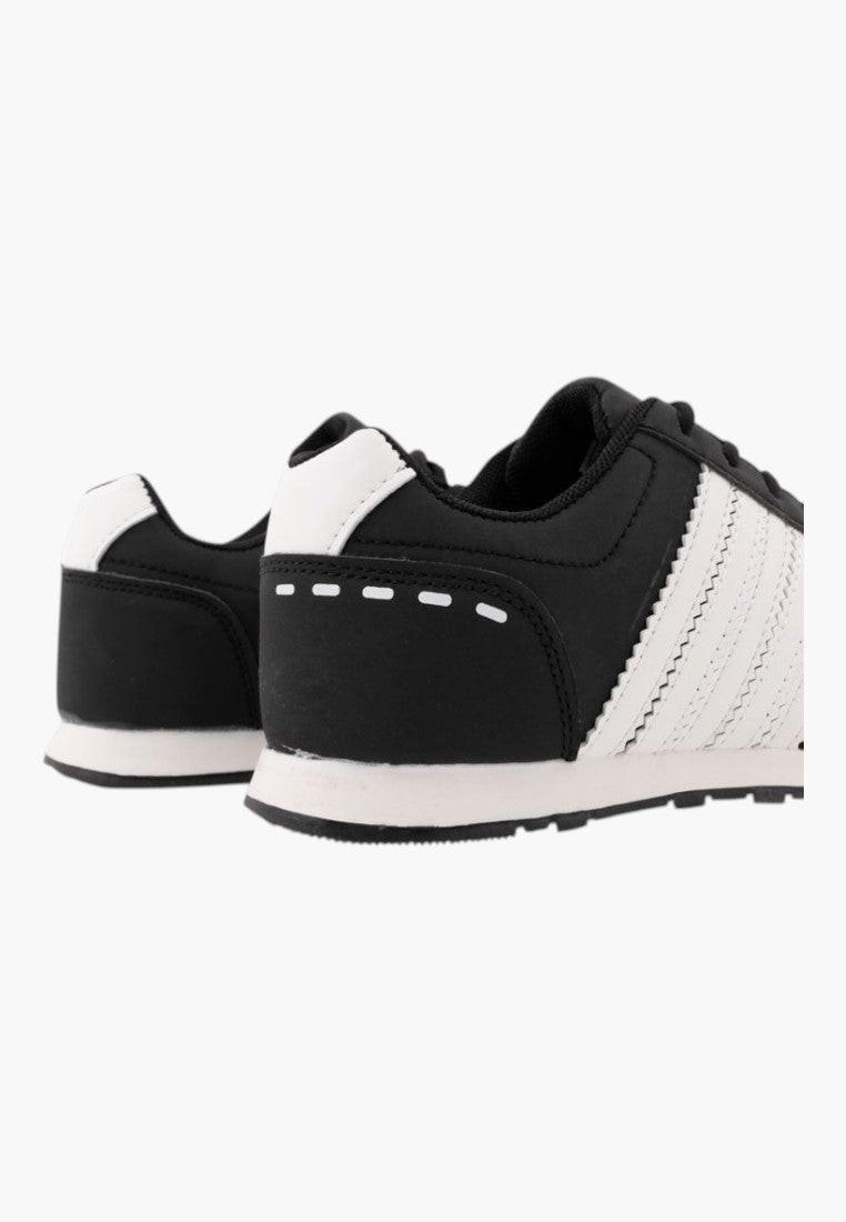 Side view of black athletic shoes with a streamlined design and breathable material