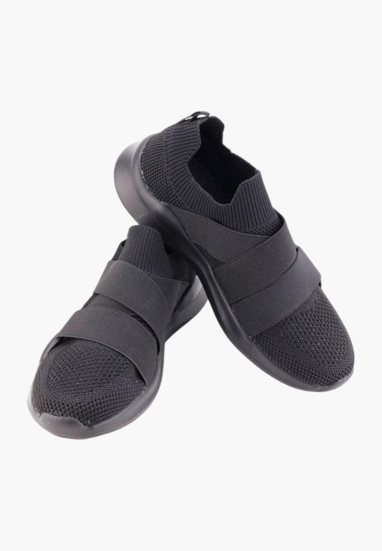 Czarne buty sportowe damskie z ekoskóry, widok z boku