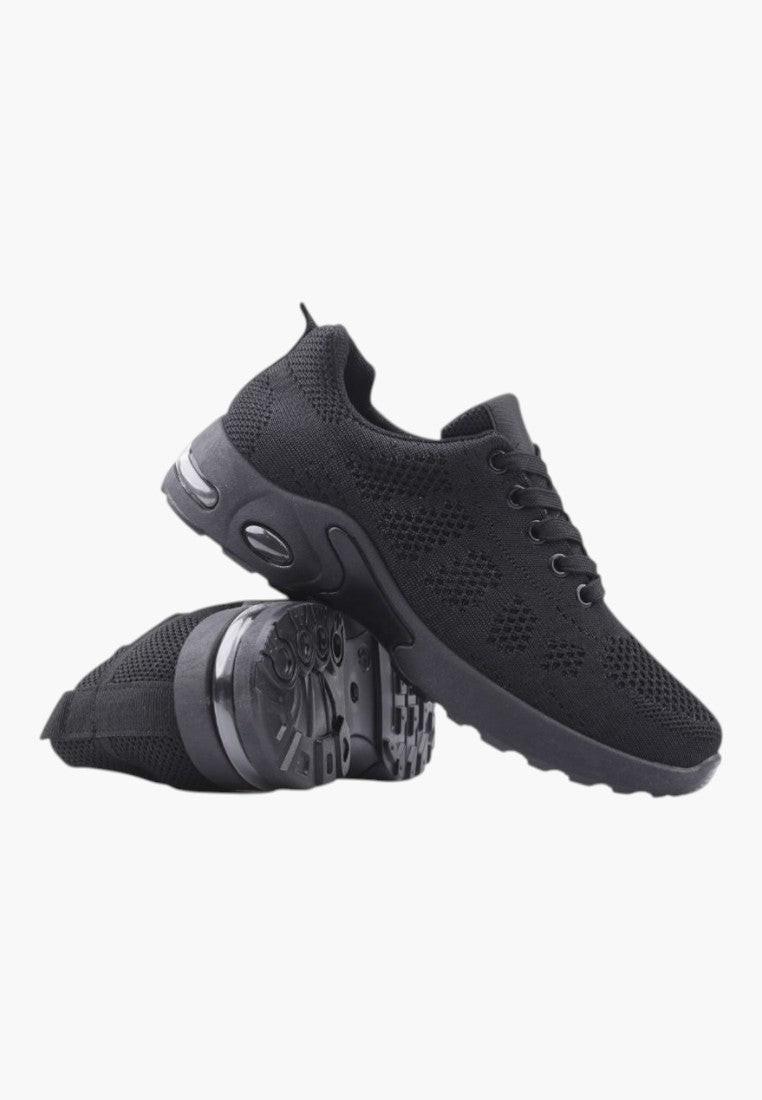 Widok z boku czarnych sneakersów damskich z chunky sole.