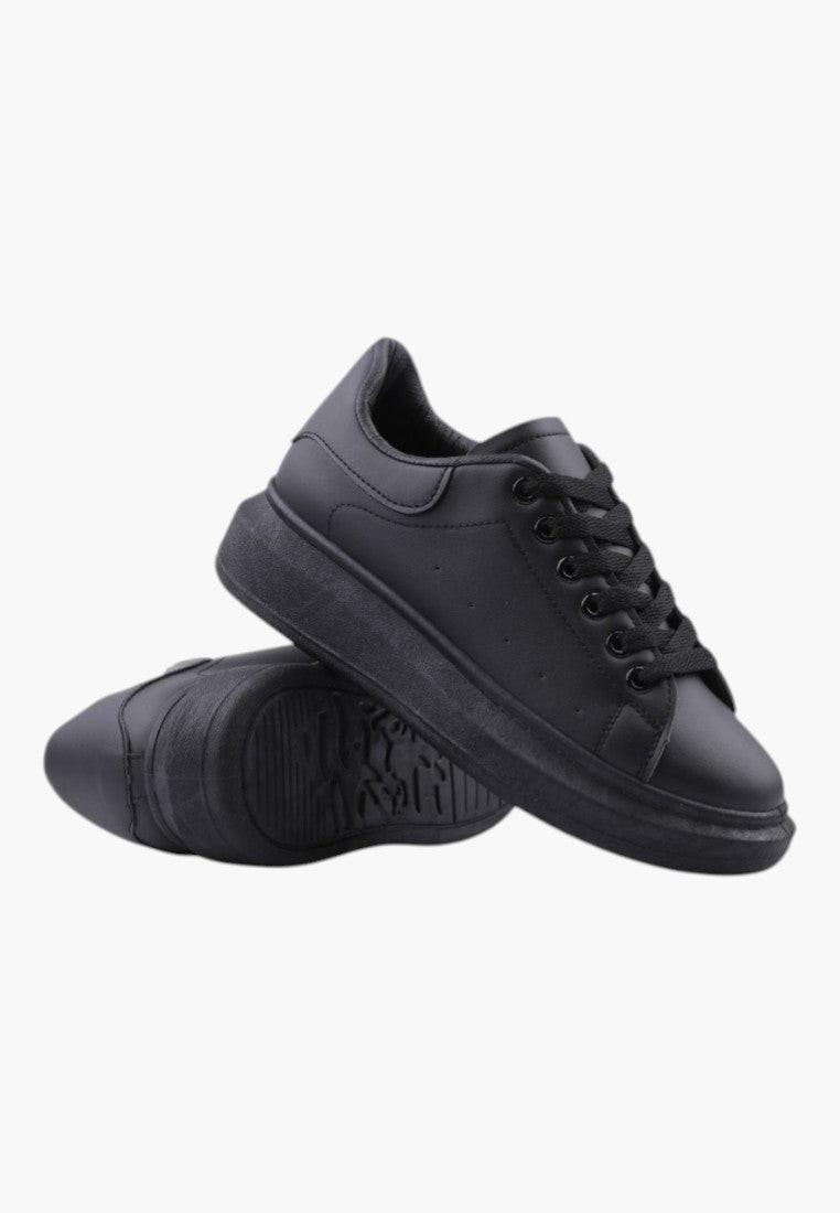 Other view of black sneakers featuring a lace-up design and smooth finish