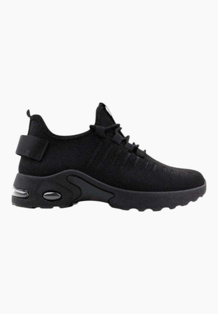 Czarne sneakersy damskie z okrągłym noskiem, widok z boku.