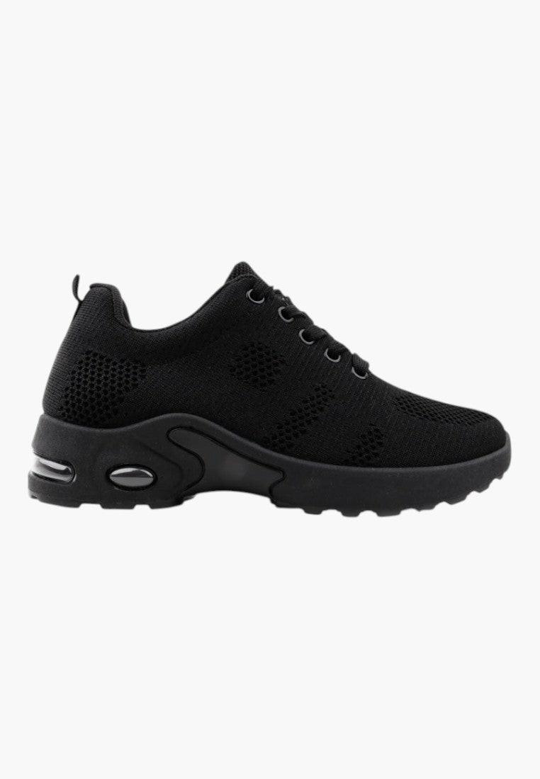 Czarne sneakersy damskie z okrągłym noskiem, widok z boku.