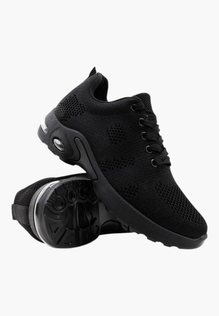 Czarne sneakersy damskie z siateczkową cholewką, widok ogólny.