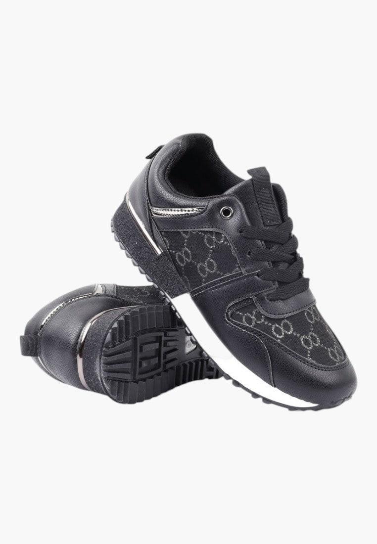 Czarne sneakersy damskie z teksturowanym wzorem, widok z boku