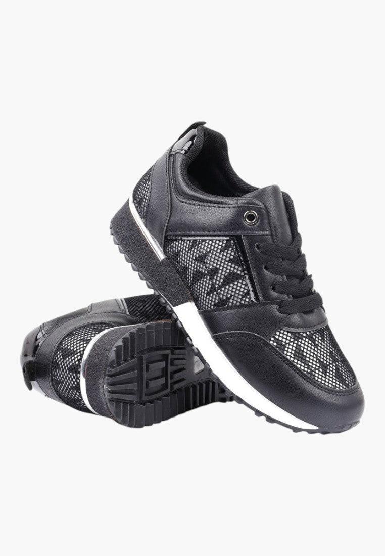 Czarne sneakersy damskie, teksturowana cholewka, widok ogólny.