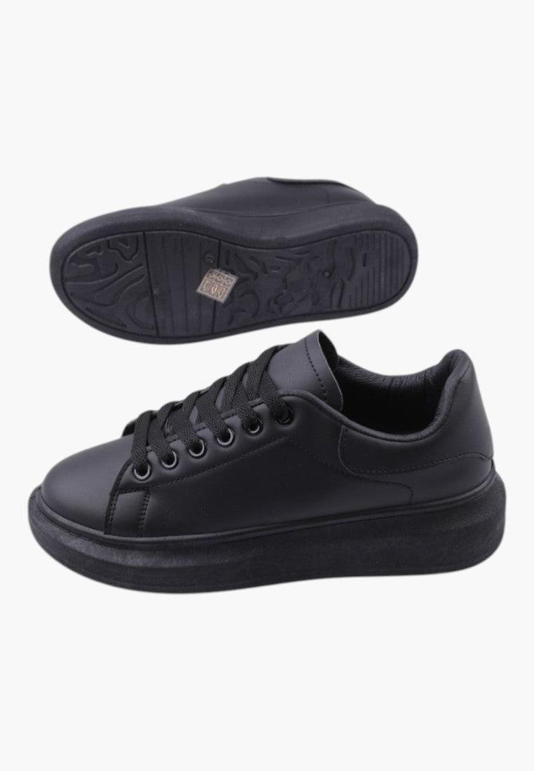 Back view of black women's sneakers with a smooth finish and decorative pattern