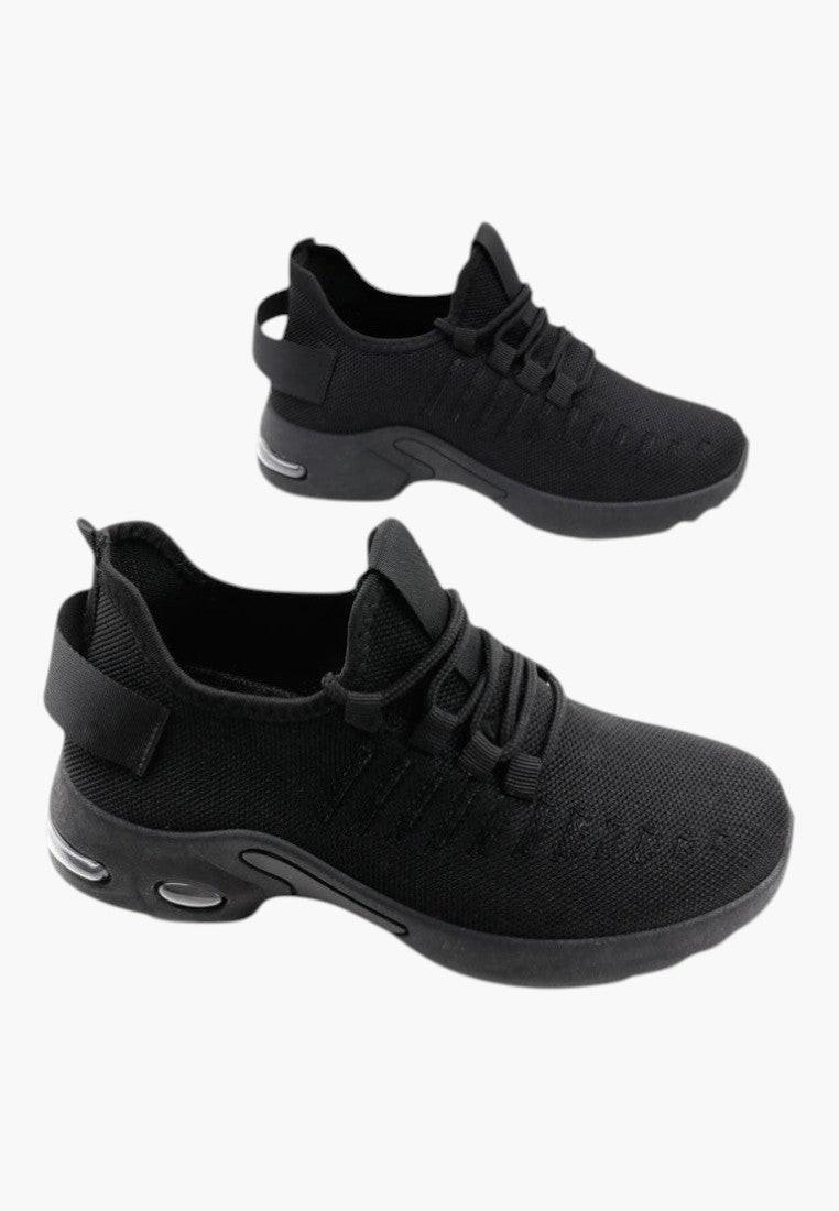 Czarne sneakersy damskie z wzmocnionym noskiem, zbliżenie.