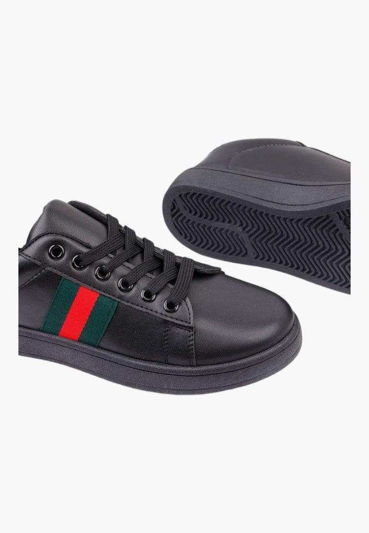 Czarno zielone buty sportowe damskie z detalem na pasku, widok z bliska