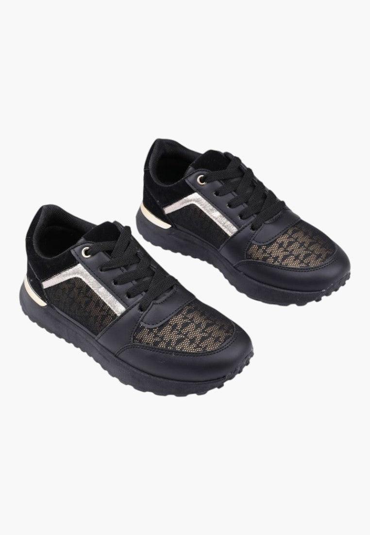 Czarno złote sneakersy z przodu, elegancki design i siateczkowy materiał.