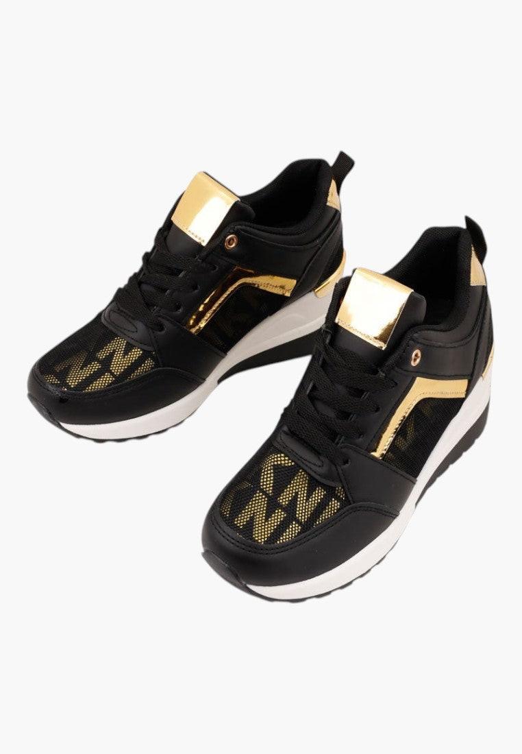 Czarno-złote sneakersy damskie, stylowy design, widok lifestyle.