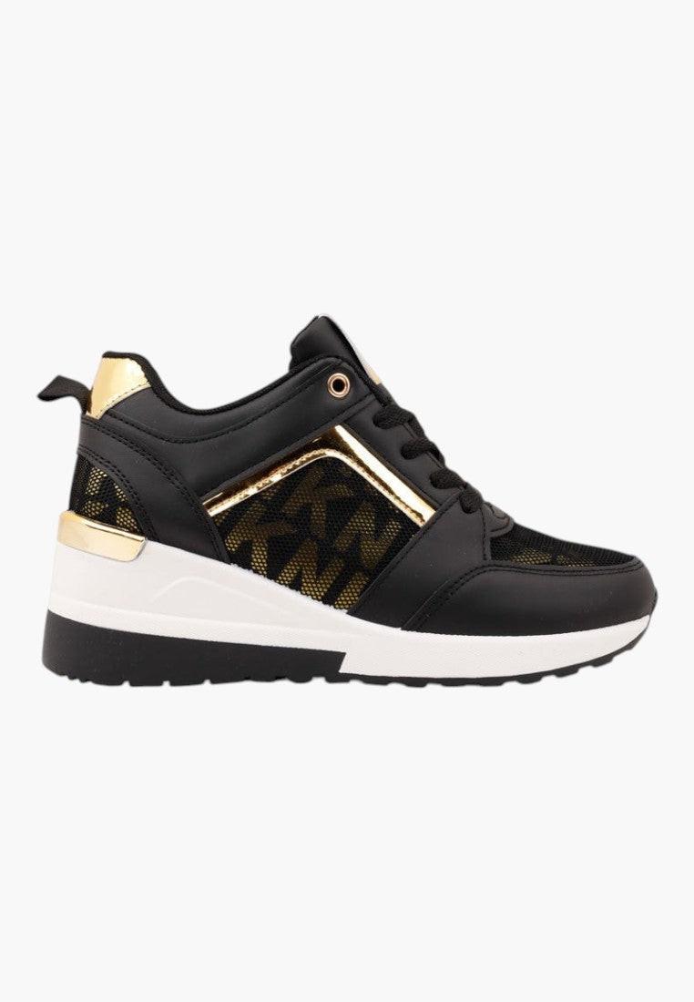 Czarno-złote sneakersy damskie, widok z boku, gruba podeszwa.