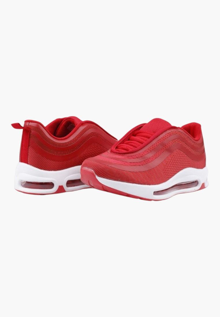 Czerwone buty sportowe w stylowym ujęciu, widok lifestyle
